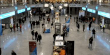 AI and how it can help your next trade show - gif of trade show floor